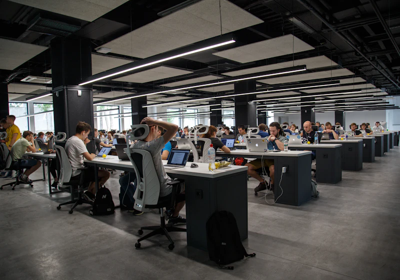 Open-plan office with people working at desks